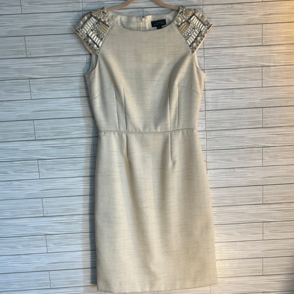 Elegant Cream Dress with Embellished Shoulders